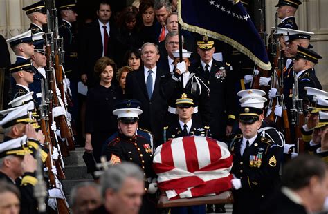 who is the military woman escorting the clergy at g.h.w.bush funeral S